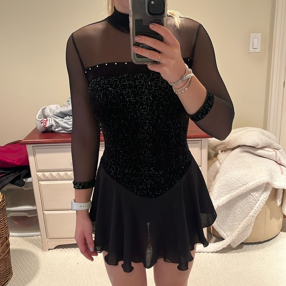Figure skating dress, black with green sparkles. Women’s small.